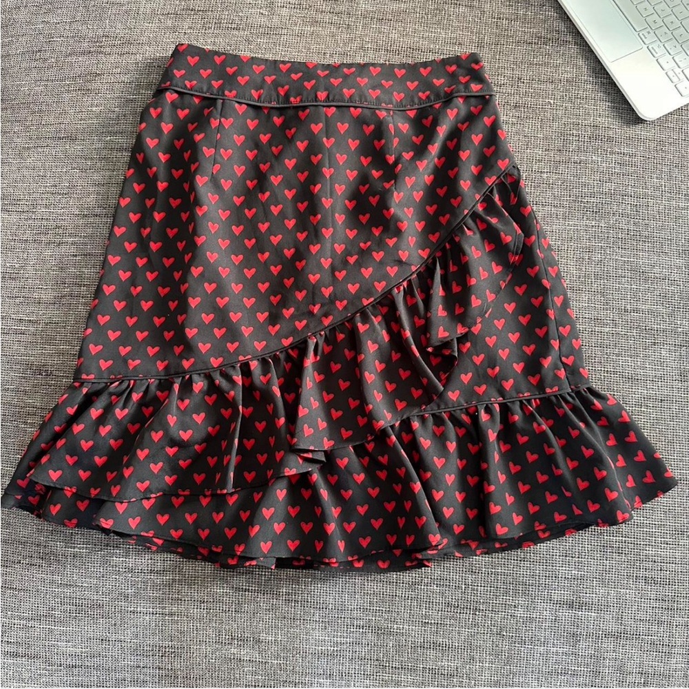 black skirt with mini red hearts